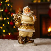 Figura decorativa de Papa Noel de 24 cm con saco de regalos en color blanco y dorado